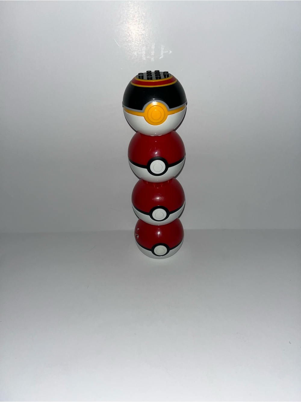 Pokemon Stackable Poké Ball Set in Red, White, Black & Yellow